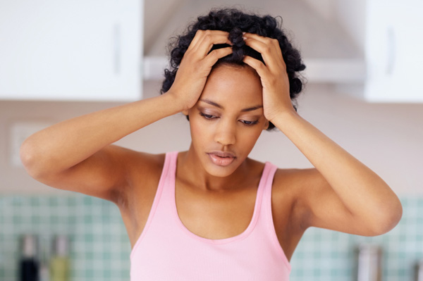 worried-woman-in-kitchen