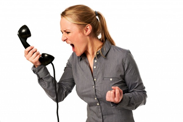 bigstock-business-woman-yelling-at-phon-29110781